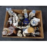 A box of assorted figurines