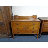An Edwardian oak three drawer dressing chest (no mirror)