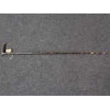 An antique whistling walking stick