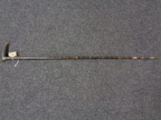 An antique whistling walking stick