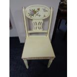 A cream and gilt Chinese style dining chair with bird and flower decoration