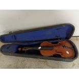 A twentieth century violin in coffin case