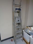 Three sets of aluminium folding steps and ladders