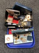 A tray of assorted costume jewellery, brooches, necklaces, earrings,