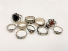 Twelve various silver rings