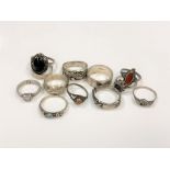 Twelve various silver rings