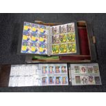 A box of albums containing football stickers,