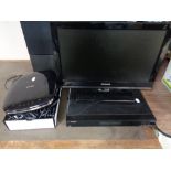 A Polaroid 19 inch LCD TV with remote together with a Samsung pebble DVD player and Humax freesat