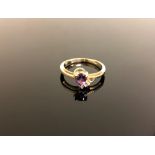 A 14ct gold amethyst and tanzanite ring size N