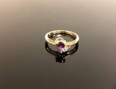 A 14ct gold amethyst and tanzanite ring size N