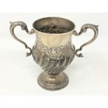 An Irish silver twin handled cup, Matthew West, Dublin, circa 1780, date letter rubbed,