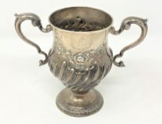 An Irish silver twin handled cup, Matthew West, Dublin, circa 1780, date letter rubbed,