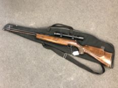 A Weihrauch .22 air rifle, numbered 1045813, with 4 x 32 scope, in sleeve.