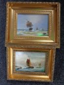 Two H. Bennett oil on boards depicting tall ships at sea in gilt frames.