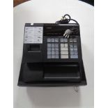 A Casio 140CR cash register with keys
