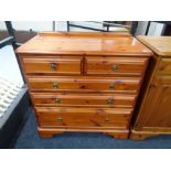 A pine five drawer chest