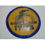 A reproduction circular Goodyear tyres sign