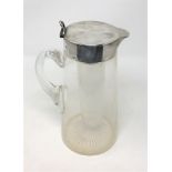 A good quality silver mounted and lidded lemonade jug with internal canister for ice,
