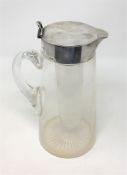 A good quality silver mounted and lidded lemonade jug with internal canister for ice,