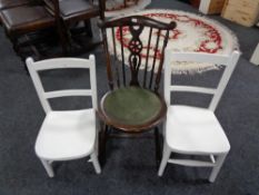 A stained beech child's wheel backed chair together with a pair of painted chairs