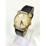 A gent's vintage 9ct gold Longines wristwatch, circa 1945/46, with unusual large, fluted lugs,
