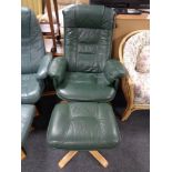 A green leather swivel relaxer chair with stool