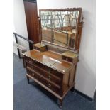 An Edwardian mahogany four drawer dressing chest