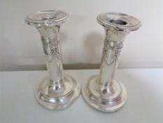 A pair of Birmingham silver candlesticks, height 12.3 cm.