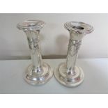 A pair of Birmingham silver candlesticks, height 12.3 cm.