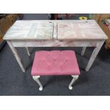 A twentieth century shabby chic double school desk together with a pink stool
