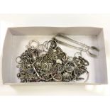 A box of silver and white metal jewellery, necklaces,