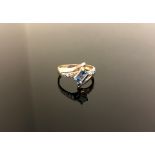 A 10ct gold emerald cut Neptune Topaz and diamond ring size M