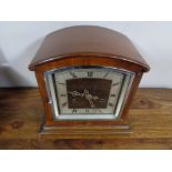 A 1930's mahogany mantel clock