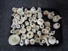 A tray of fifty pieces of crested china