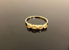 A yellow gold citrine ring, size N.