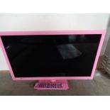 A Technika 24 inch lcd tv with remote (pink)