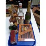 A tray of bottle of Richard Grainger champagne together with set of alcohol miniatures,