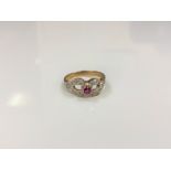 A 9ct gold diamond and ruby ring,