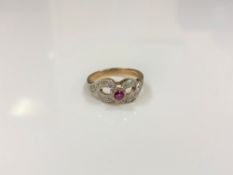 A 9ct gold diamond and ruby ring,