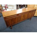 A twentieth century teak cocktail low sideboard