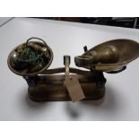 A set of vintage kitchen scales with weights