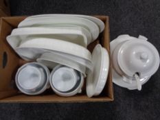 A quantity of white meat plates, oven dishes,