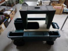 A garden multi purpose trolley together with a kneeler