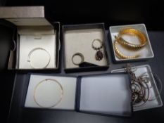 A box of 9ct gold baby bangle together with other silver and costume jewellery