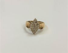 A 9ct gold diamond set ring, size N.