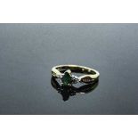 A 10ct yellow gold emerald and diamond ring, approximately 0.25ct emerald, size M.