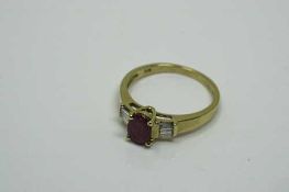 A 10ct gold ruby and diamond ring, the central ruby approximately 1ct, 2.6g, size N.