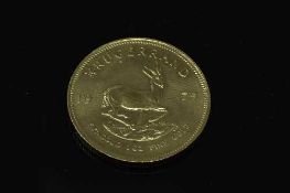 A South Africa gold 1 oz Krugerrand 1975.