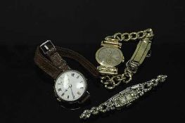 A vintage Bulova wrist watch together with a lady's and gent's silver watch.