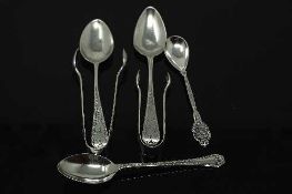 Two nineteenth century silver teaspoons together with a small pair of silver sugar nips,